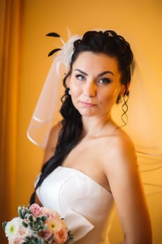 beautiful young bride stand on background forest