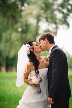 beautiful young couple stand on the balcony