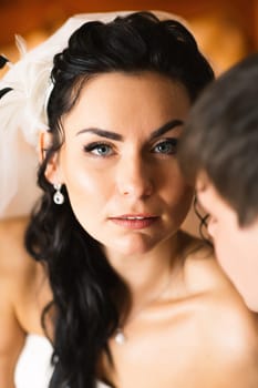 beautiful young couple stand on the balcony