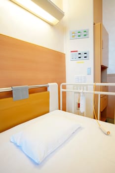 Hospital room with empty bed and comfortable medical equipped in a hospital
