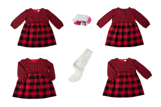 Clothes for children. A set of a beautiful red and black checkered girl dress isolated on a white background. Children fashion.