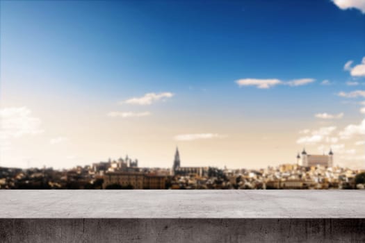 View of historic city at sunset from terrace wall