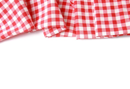 Red checkered folded picnic cloth border (napkin) isolated on a white background. Template for your product display montage.