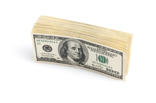 A stack of one hundred dollar American notes standing on a white background.