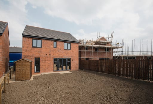 Exterior shot of a new build house in development.
