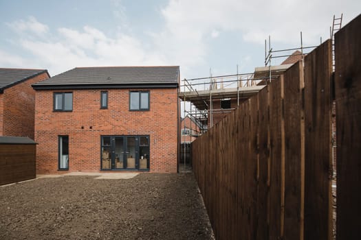 Exterior shot of a new build house in development.