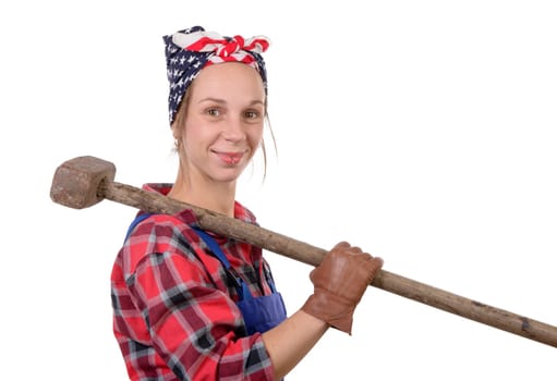 a pretty young working woman with a sledgehammer on the white background