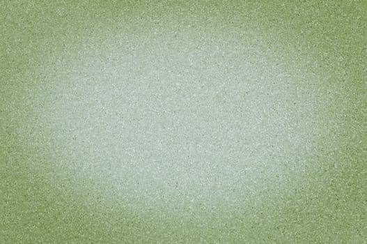 Texture of granite light green color with small dots, with vignetting.