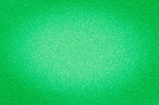 The granite texture is a bright green color with small dots, with vignetting.