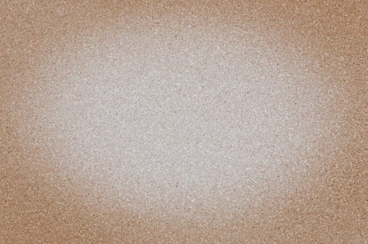 Texture of granite brown color with small dots, with vignetting.