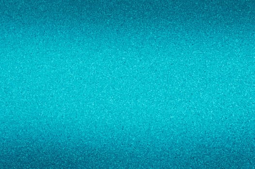 Granite background of blue with small dots.