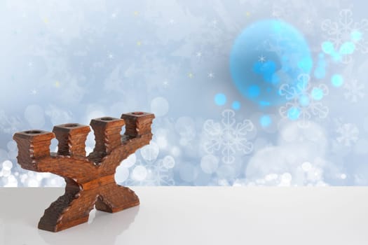 Template winter background.  An old wooden candle holder on a bright table with space on right site in front of beautiful abstract winter landscape. Template for your product display montage.