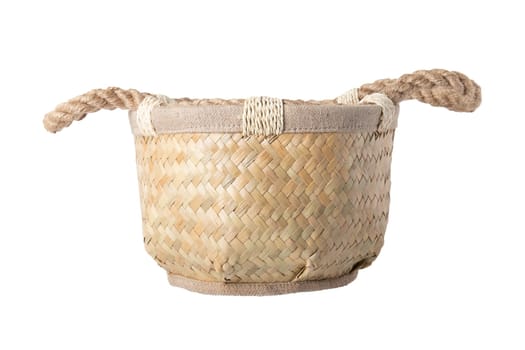 Empty straw basket with handles of rope isolated on white background. For your food and product display montage.