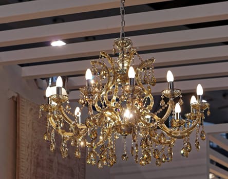 Golden crystal chandelier with energy saver lamps