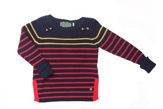 Autumn and winter children clothes. A red black striped cozy warm sweater or pullover isolated on a white background. Autumn fashion.