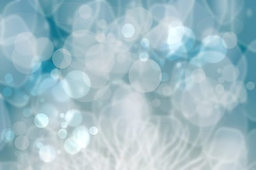 Underwater world. Abstract blue lightening bokeh circles from unterwater bubbles. Beautiful blue illustration.