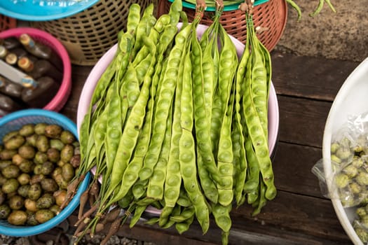 Close up image of various fresh vegetables at farmers market in bangkok, thailand