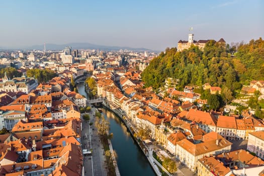 Aerial panoramic view of Ljubljana, capital of Slovenia in warm afternoon sun.