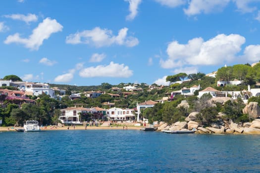 View on the beautiful village of Port Rafael from the sea, Sardinia, Italy.