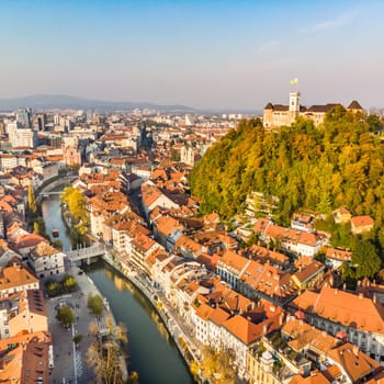 Aerial panoramic view of Ljubljana, capital of Slovenia in warm afternoon sun.