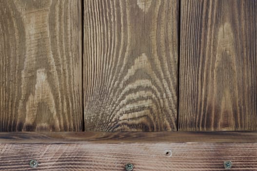 Textural background of wooden boards and one horizontal board.