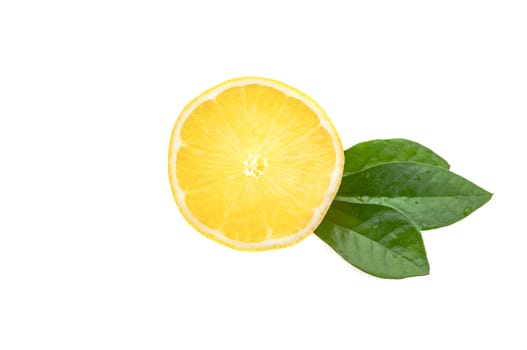 Half of a fresh, clean, glowing yellow lemon with green leaves on a white background.