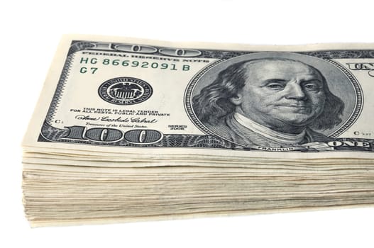 A stack of one hundred dollar bills on a white background.