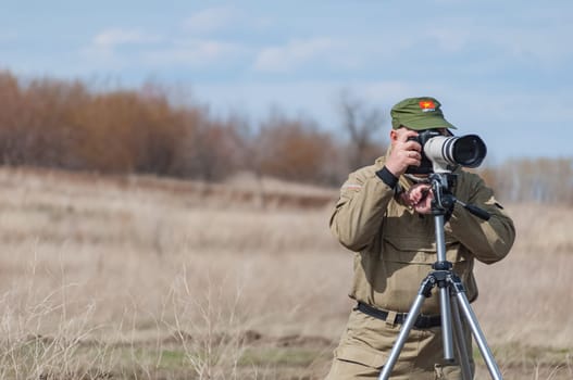 2018-04-30 Samara Region, Russia.  The photographer is working on shooting a report about the II World War.
