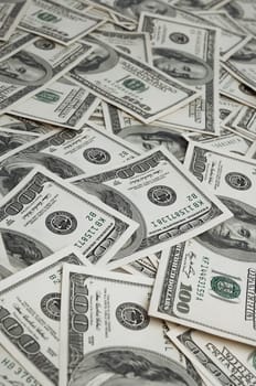 A background of one hundred dollar bills.