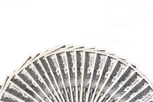 A fan of one hundred dollar bills on the long side. White background.