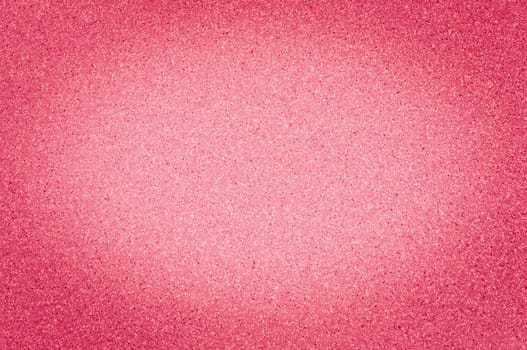 Texture of granite scarlet color with small dots, with vignetting.
