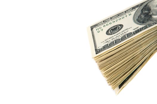 A stack of one hundred dollar bills on a white background. Isolated.