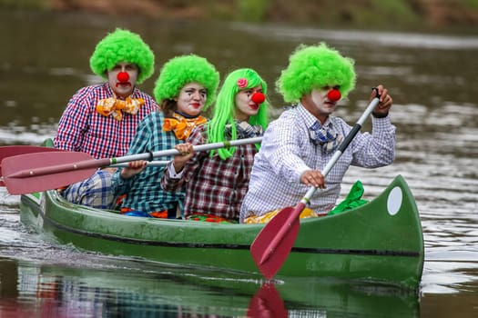 People boating on river Gauja in Latvia, peacefull nature scene.