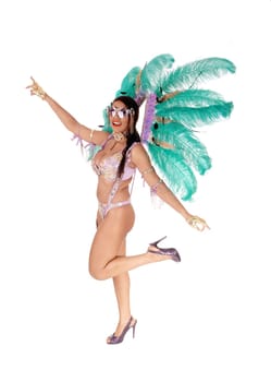 A full length image of a woman in an carnival outfit with green feather.on her head standing in profile, isolated for white background.