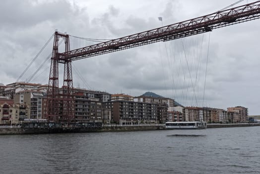 the suspension bridge of bizkaia (puente de vizcaya) between getxo and portugalete over the ria de bilbao.