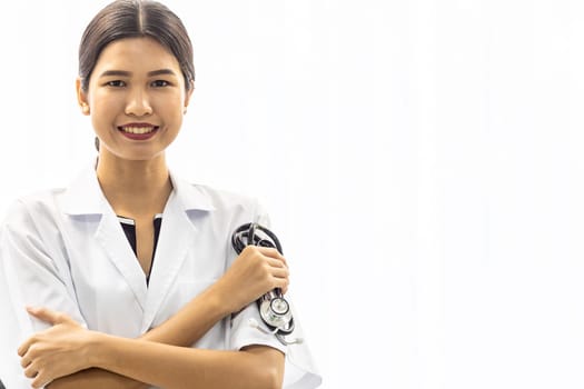 Female Doctor holding stethoscope with copyspace