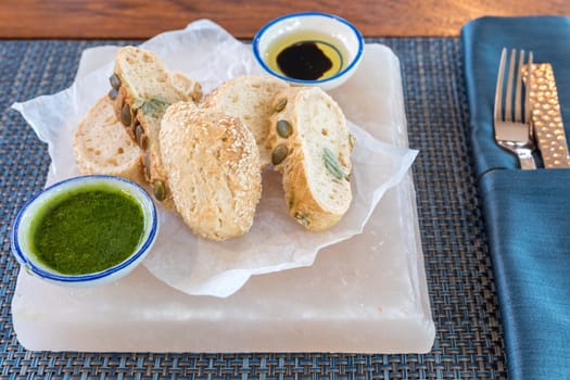 Fresh sliced italian Ciabatta bread with pesto sauce