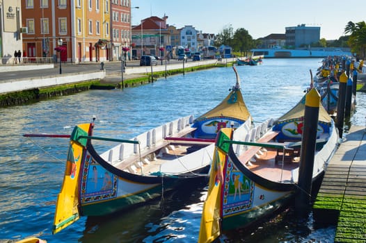 AVEIRO, PORTUGAL - JUL 01, 2017: Traditional Moliceiro boats on main city canal in Aveiro, Portugal in a  summer day