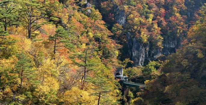 Naruko Gorge valley with train railroad tunnel in Miyagi Tohoku Japan panorama