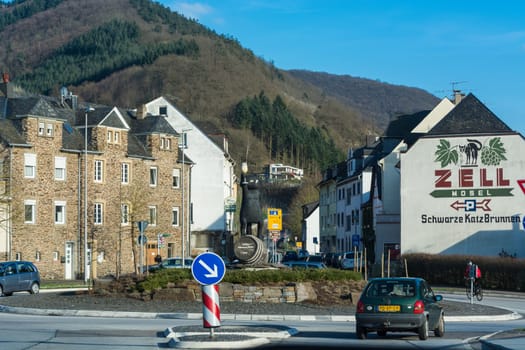 ZELL, GERMANY - MARCH 26, 2016: Entrance to Zell am Mosel with roundabout and view of the symbol and logo for the famous wine of Zell, Moselle, Rhineland-Palatinate, Germany, Europe.