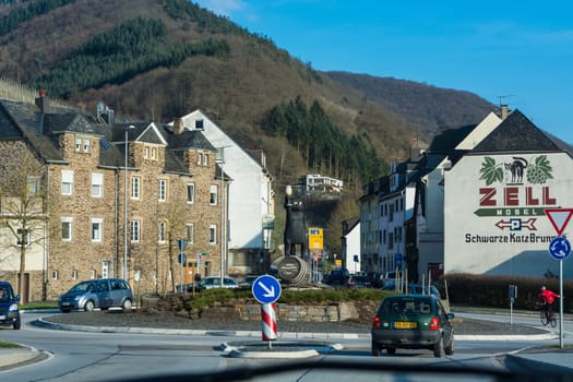 ZELL, GERMANY - MARCH 26, 2016: Entrance to Zell am Mosel with roundabout and view of the symbol and logo for the famous wine of Zell, Moselle, Rhineland-Palatinate, Germany, Europe.