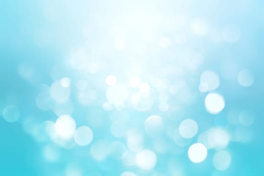 Abstract colorful blur blue texture background with white and blue bokeh circles in soft color style. Template for underwater backdrop or winter design illustration.