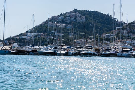 PORT ANDRATX, SPAIN - JUNE 01, 2016:.View of the Bay of Port Andratx Mallorca Baleares Spain. In the background motor boats and sailboats.