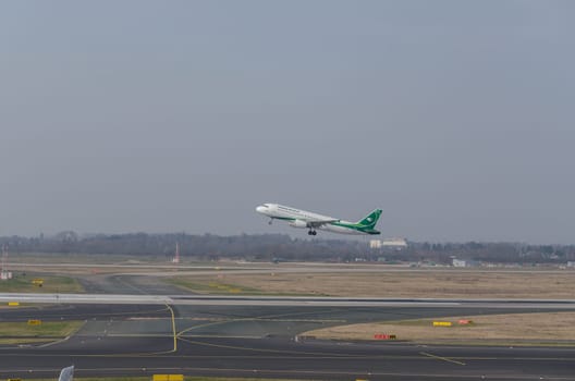 Dusseldorf, NRW, Germany - March 18, 2015: Airbus A321 of Irak Airlines at startup on the Dusseldorf airport.