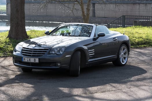 MOSEL, GERMANY - MARCH 26, 2016:.Chrysler Crossfire Roadster in a parking lot in Germany on the Mosel.