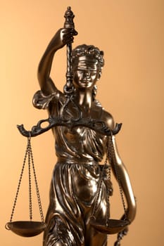 Justizia Figure on beige Background