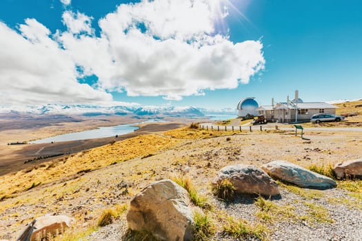 Mount John's Observatory at Mt John in autumn season near Tekapo lake Southern Alps mountain valleys New Zealand