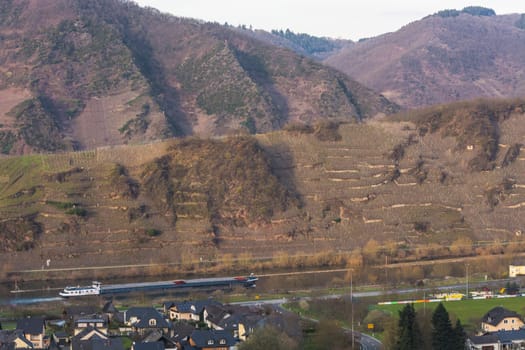 MOSELTAL, GERMANY - MARCH 26, 2016:.Panoramic view over the Moselle valley in the background the vineyards and the River Moselle.