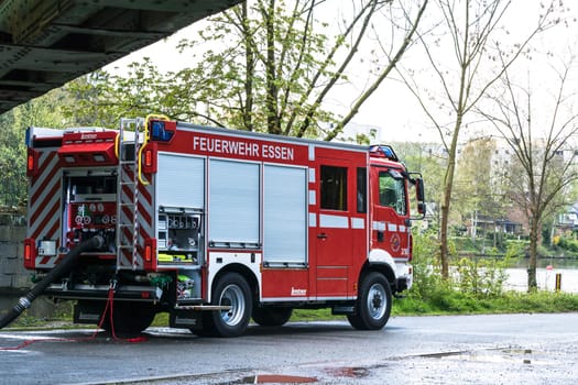 ESSEN KETTWIG, NRW, GERMANY - APRIL 28, 2016:.Fire fighter trainer use in Essen Kettwig, Germany. Firefighters in Uniform during training.