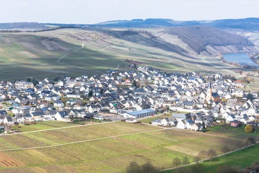 MOSELTAL, GERMANY - MARCH 26, 2016:.Panoramic view over the Moselle valley in the background the vineyards and the River Moselle.